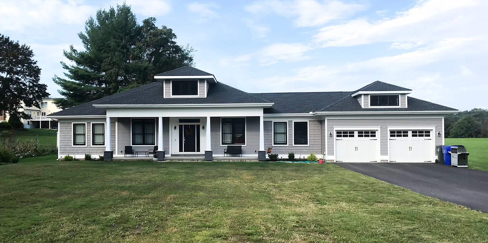 Window replacement, door replacement, garage door replacement, roof replacement and vinyl siding replacement on a house in CT